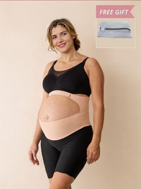 Momcozy pregnancy belly band worn over the bump, with the mesh laundry bag included