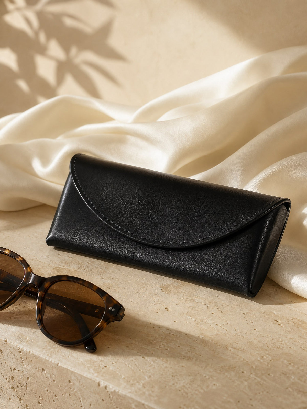 Lunettes Glasses Case, styled on travertine