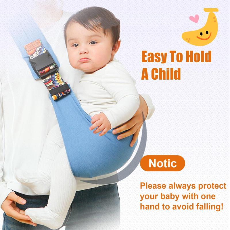 Baby held on the hip in the sling — always keep one hand on your baby