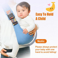 Baby held on the hip in the sling — always keep one hand on your baby