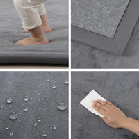 Detail: foam depth underfoot, bound edge, water beading on the surface and wiping clean