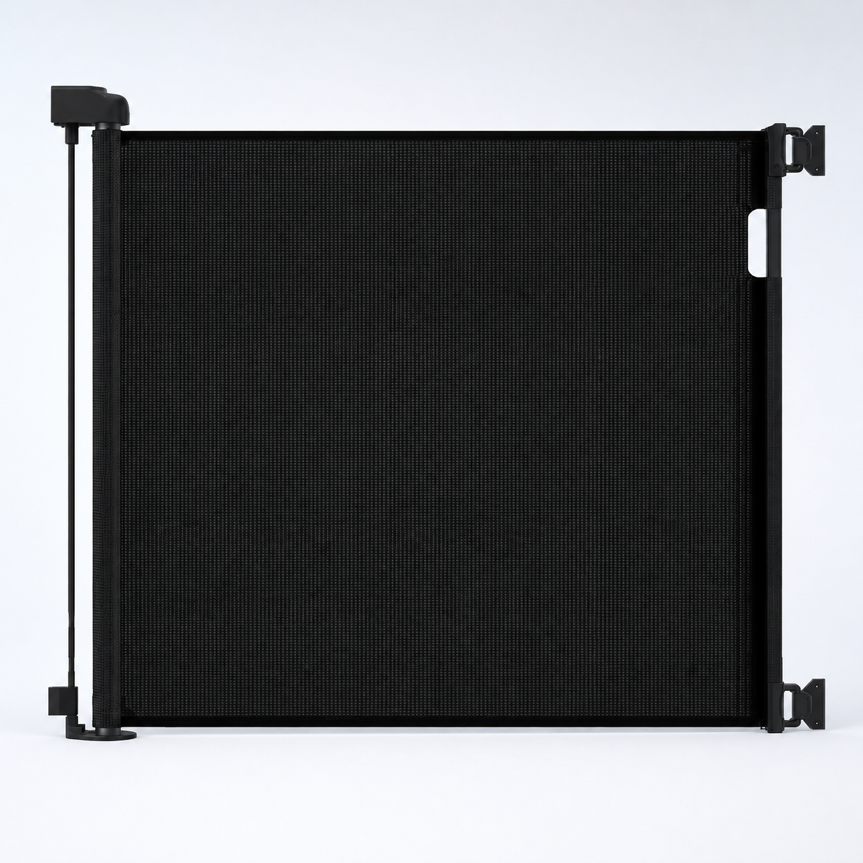 Black retractable mesh pet gate fully extended on a cool white background