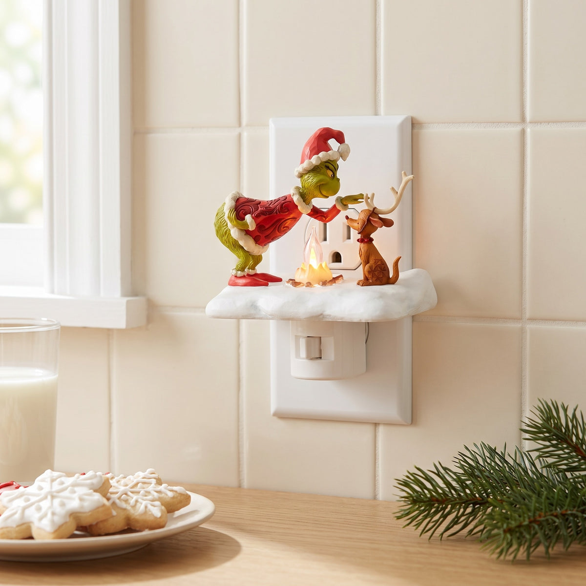 Christmas Campfire Nightlight Plugged In Next to Milk and Holiday Cookies View 5