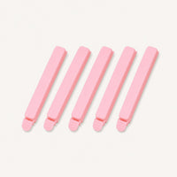 Five pink food bag sealing clips View 1