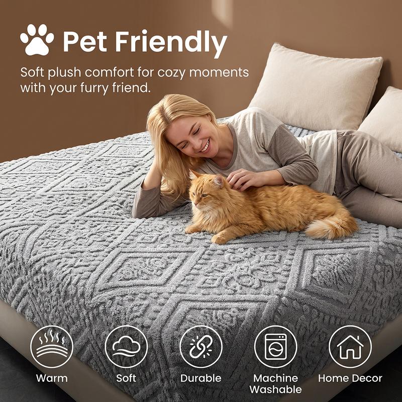 Embossed plush fitted sheet on a bed