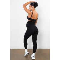 Back three-quarter view showing the full length and high waistband