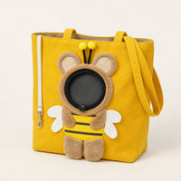 Baby Bubble Bumble Buddy pet carrier tote in bumblebee yellow canvas, studio front angle View 1
